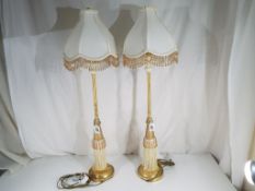 A pair of good quality table lamps,