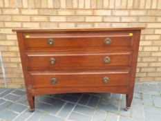 A chest of three drawers,