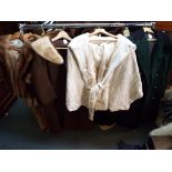 Four lady's coats, one light brown fur coat marked Leeds Boston, approximate length 60 cm ,