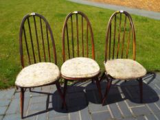 Three stick back Ercol dining chairs (3)