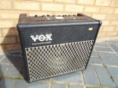 A Vox Valvetronix amplifier model AD30VT serial no 071857 with mains lead and manual