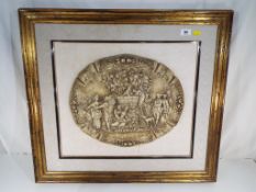 A heavy, oval ceramic framed picture with couples dressed in period clothing, mounted and framed,