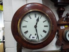 A mahogany cased circular wall clock circa 1890, 30 hour movement,