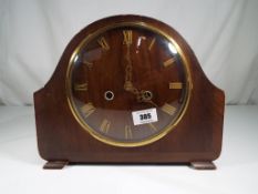 A mahogany cased Smiths Enfield mantle clock Roman numerals striking on the hour and half hour with