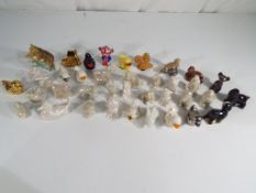 Wade - A collection of approximately 37 Wade Whimsies and Wade Whoppa ceramic figures