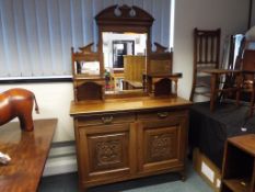 Withdrawn - A mahogany carved front Victorian two door sideboard under two drawers with brass