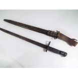 A World War One (WW1) 1917 dated US Winchester Bayonet For P 14 Rifles and Scabbard. A U.S.