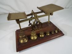 A set of early 20th century postal scales with complete set of weights Est £20 - £40