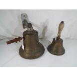 A large wall mounted brass bell approx 9.