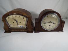 An oak cased art deco mantle clock,