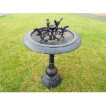 A good quality Victorian cast iron bird bath approx 90cm (h) x 50cm (diam)