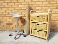 A wicker chest of drawers,
