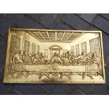 A good quality brass wall plaque with relief decoration of The Last Supper,