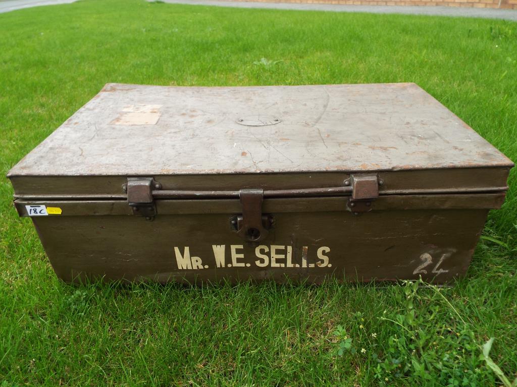 An early to mid period Merchant Navy metal trunk, marked 'Mr W E Sells',