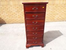 A mahogany chest of seven drawers,