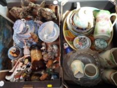 A good mixed lot to include, a quantity of ceramics comprising Imari ware, a ceramic charger, jugs,