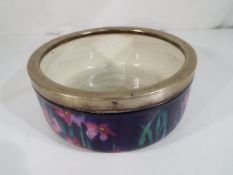 George Jones - a George Jones Imperial Rouge bowl with a white metal rim decorated in a floral