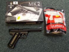 A KJWORKS Mk 2 6 mm BB CO2 Pistol with a near full bag of 6 mm BB pellets, nominal use,