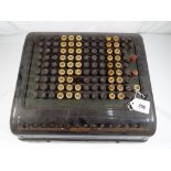 A Burroughs mechanical adding machine