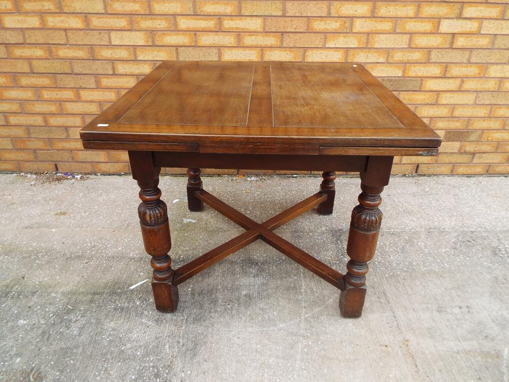 An oak drawer leaf dining table on carved support ca 1940's, - Image 2 of 2