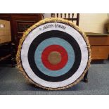 An archery straw target by Jaques of London, approx 70cms diameter,