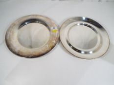 Two stainless steel Georg Jensen plates
