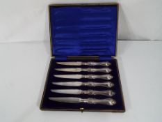 A cased set of six Edward VII fish knive