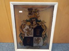 A panel of stained glass with crest and