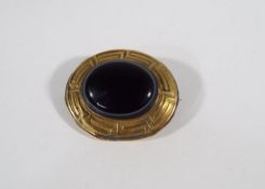 A lady's mourning brooch with large oval