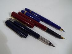 Three fountain pens to include Parker an
