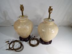 A pair of good quality ceramic table lam