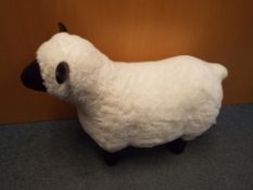 A black-faced sheep footstool, approxima