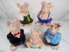 Wade - A full set of 5 Natwest pigs money banks by Wade with stoppers.