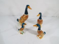 Beswick Pottery - 4 ceramic models of mallard ducks by Beswick Pottery,