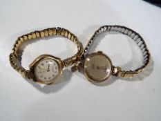 A lady's hallmarked 9 carat gold wristwatch with expandable bracelet,