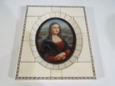 A good quality ivory framed oval picture depicting a lady in period costume ( picture size 8 cm x 6.