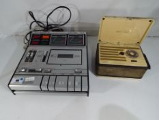 A Grundig cassette player, model CN730 and a Marconiphone personal receiver model P20B,