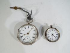 A hallmarked silver cased pocket watch with key, Chester assay,