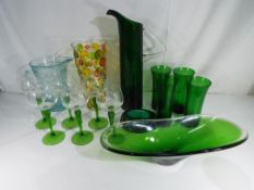 A good lot to include a lemonade set,comprising of a jug and four glasses, an art glass vase,