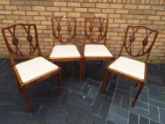Four good quality antique oak dining chairs with upholstered drop-in seats (4)