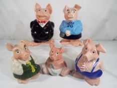 Wade - A full set of 5 Natwest pigs money banks by Wade with stoppers.