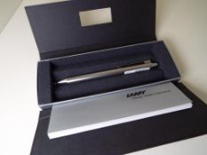 Lamy - an unused propelling pencil with brushed steel barrel,