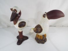 Two Grotesque Fantasy ceramic birds one depicting a Toucan with three toes approx 28cm (h) and the