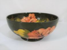 Moorcroft Pottery - A medium sized pedestal bowl decorated to the exterior and interior with pink
