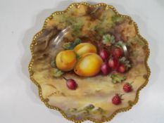 Royal Worcester - A large Royal Worcester plate with scalloped edge in the "Fallen Fruits" pattern,