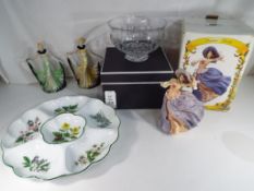 A pair of circa 1920s ceramic figurines of ladies, a Royal Worcester sectional serving dish,
