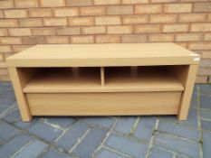 A good quality TV cabinet with drop down front, 40 cm x 100 cm x 39.