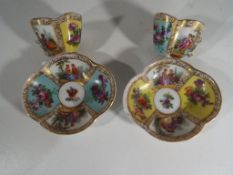 Meissen - 2 miniature cup and saucer sets by Meissen decorated with courting couples and floral