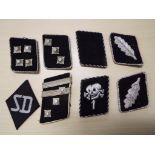 A collection of eight various German black collar tabs to include a Totenkopf example - NOTE: