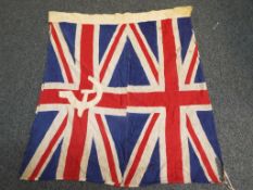A hand sewn Union flag with added hammer and sickle.